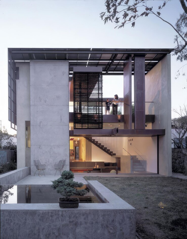 Photo une maison avec un escalier qui a un échelon qui a un escaliers qui mène à un balcon