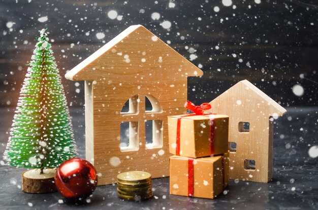 maisons en bois et arbre de Noël vente de Noël de l'immobilier réductions de nouvelle année