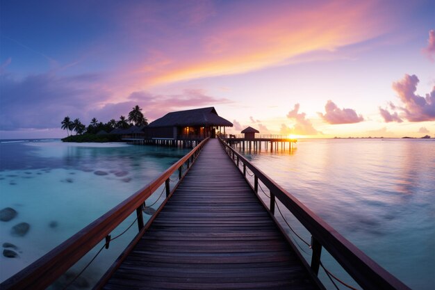 Photo les maldives au coucher du soleil un paradis de plage avec des cieux colorés des villas d'eau et de la tranquillité