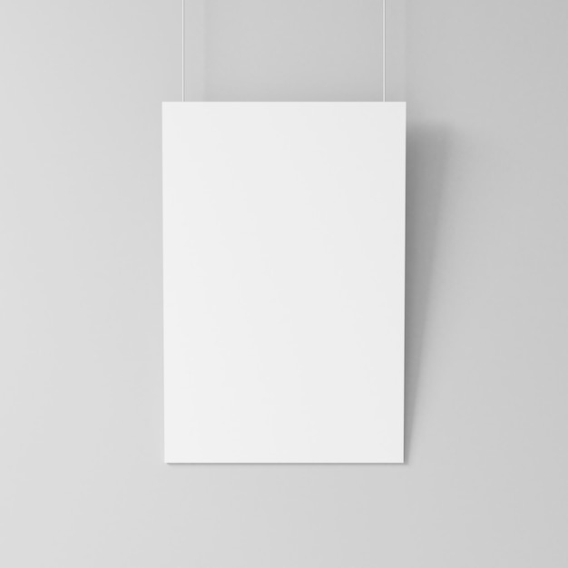 Photo maquette d'affiche vierge blanche accrochée au mur rendu 3d