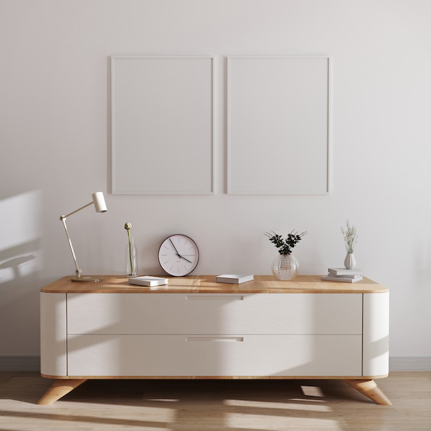 Maquette de cadres d'affiches dans un intérieur moderne. Cadres vides au-dessus de la commode blanche avec un beau décor. Style scandinave, maquette de cadre, rendu 3D