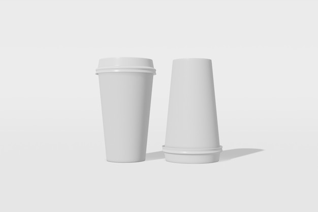 Maquette de deux gobelets en papier avec un couvercle sur un fond blanc. Une des tasses est retournée. Rendu 3D