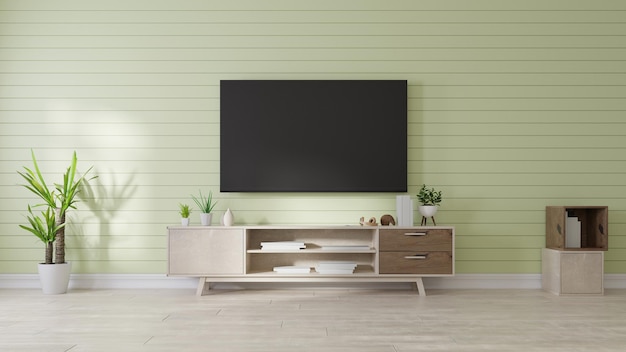 Maquette d'intérieur Smart TV dans la chambre avec un sur le mur vert