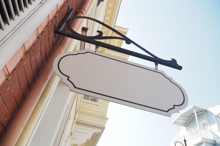 Photo maquette de panneau de rue sur un bâtiment de ville moderne