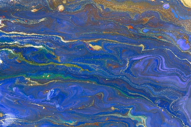 Marbre bleu et or abstrait motif liquide marine avec des paillettes dorées