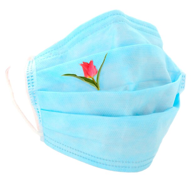 Masque de médecin et protection contre le virus corona et fleur de tulipe