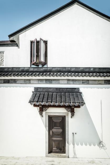 Matériel de fond de mur blanc de carreaux gris de style chinois