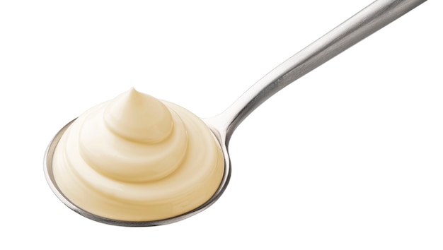 Mayonnaise en cuillère isolé sur fond blanc