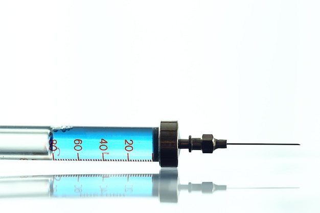 Photo médecine de seringue vintage, vaccin concept, injection, drogue