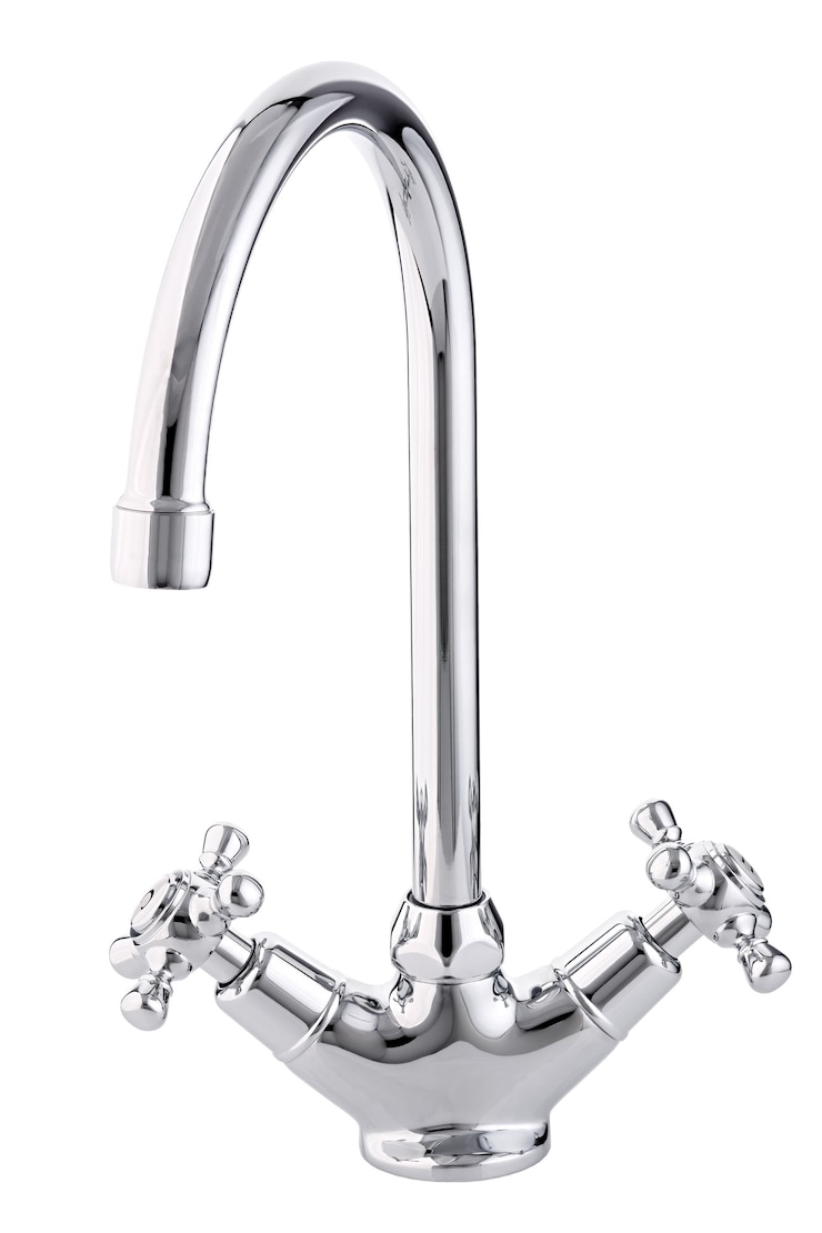 Photo mélangeur eau chaude et froide. salle de bain avec robinet moderne. robinet de cuisine. surface blanche isolée. vue d'en-haut.