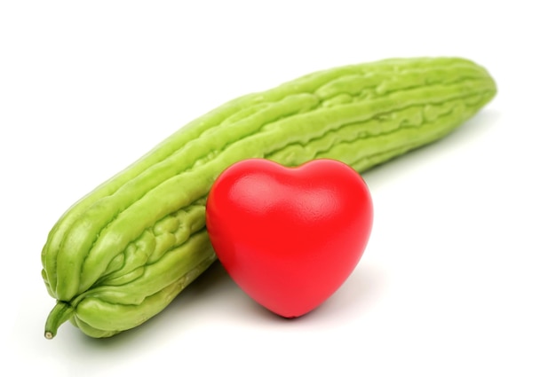 Melon amer frais avec un coeur rouge Maladie cardiaque de pression artérielle de soins de santé