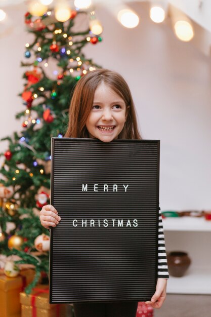 Message de joyeux Noël sur un tableau noir