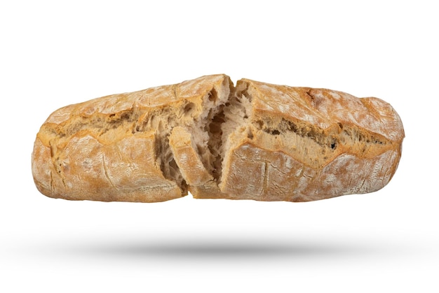 Une miche de pain ciabatta frais italien est divisée en 2 parties sur un fond blanc isolé Pain suspendu ou tombant sur un fond blanc Vue de dessus du pain italien