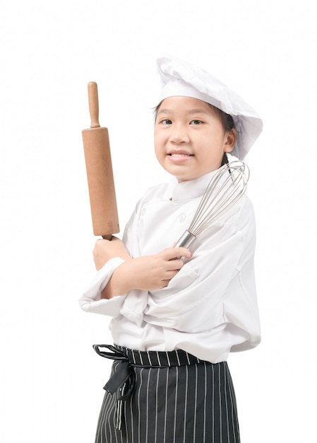 Mignon petit garçon dans un costume de chef