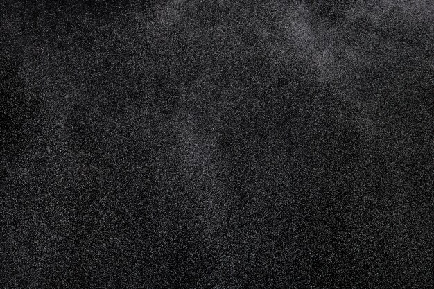 Million de poussière d'étoiles Image photo de la chute de la pluie de la neige des tempêtes de neige lourdes sur fond noir sur une couche isolée Spray de brouillard d'eau de fumée en tant que particules d' étoiles sur le vent