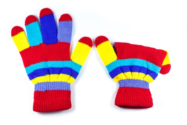 Minces gants colorés montre six doigts isolés sur blanc.