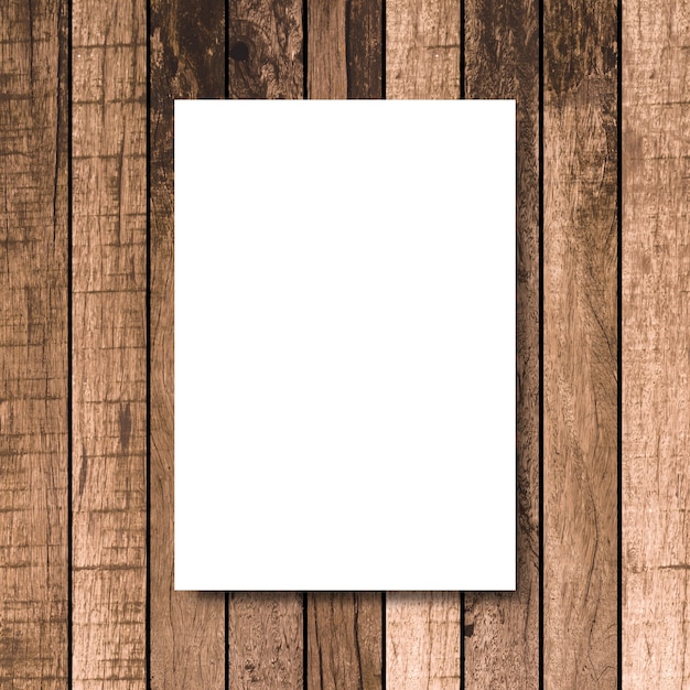 Photo mock up cadre d'affiche blanc sur fond de menuiserie bois brun vintage