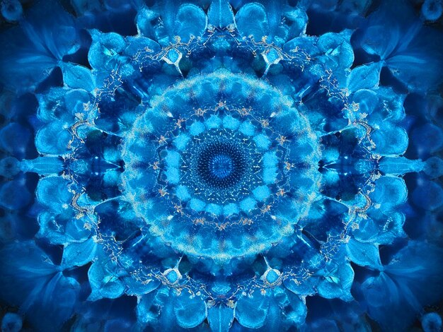 Modèle de conception de conception de kaléidoscope concentrique de centre de fleur de mandala bleu