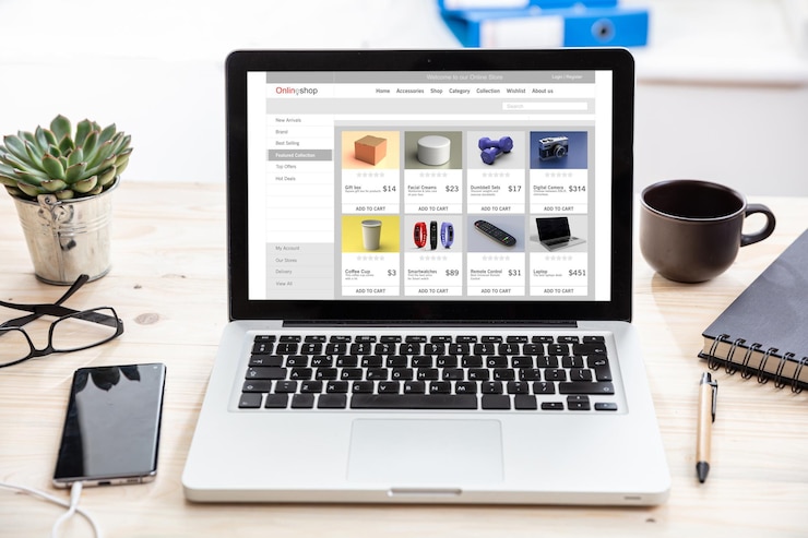 Photo modèle de conception de site web de boutique en ligne sur un fond de bureau de moniteur d'ordinateur