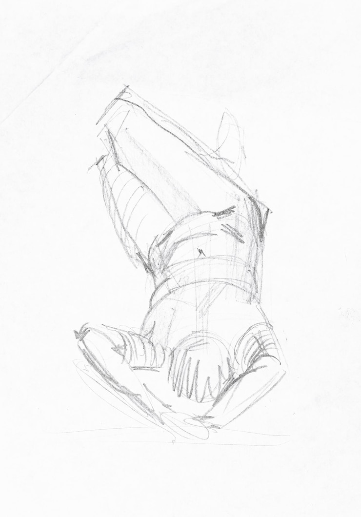 Photo modèle dessiné à la main allongé avec les mains derrière la tête