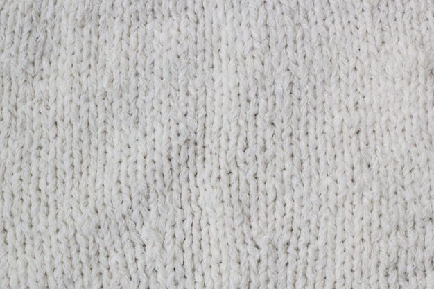 Modèle De Pull Ou écharpe De Fond De Texture De Tissu Tricoté Blanc