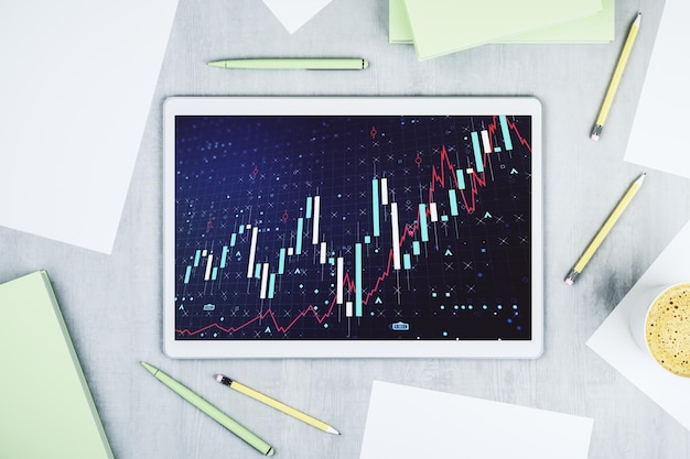 Moniteur de tablette numérique moderne avec concept de recherche et d'analyse de graphiques financiers créatifs abstraits Vue supérieure Rendering 3D