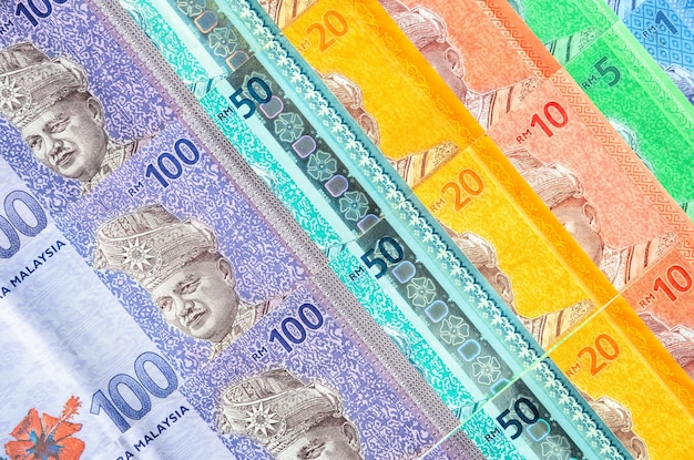 Monnaie malaisienne des billets en ringgit malaisiens fond Papier-monnaie d'un cinq dix vingt cinquante et cent billets en ringgit Concept financier