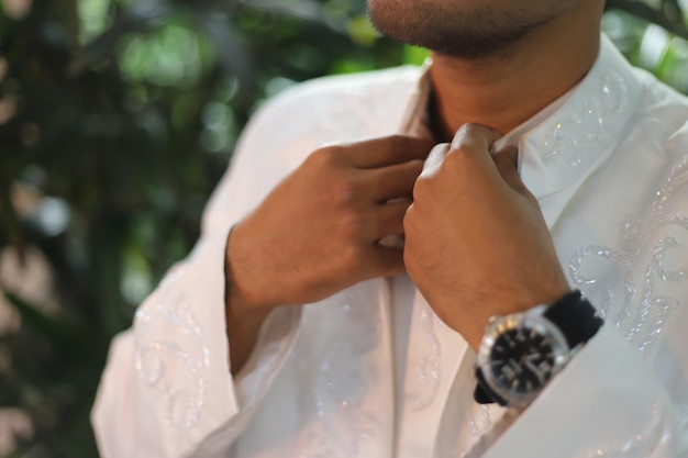 Photo montre homme en main cérémonie de mariage