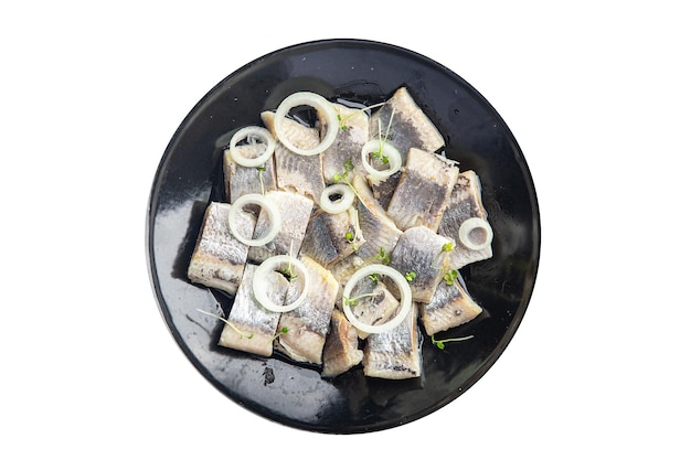 Morceau de hareng salé assiette repas de poisson de fruits de mer collation alimentaire sur la table copie espace alimentaire