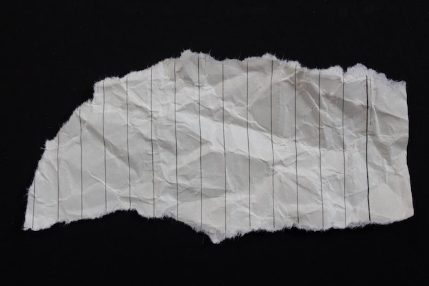 Un morceau de papier blanc avec le mot papier dessus