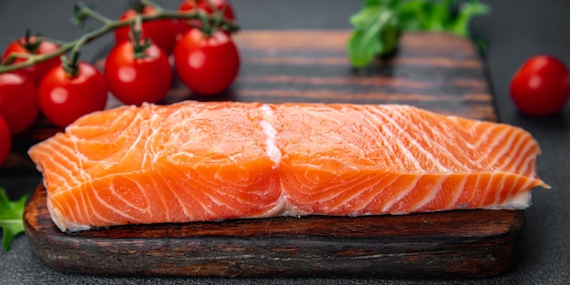 morceau de saumon cru poisson frais fruits de mer repas nourriture collation sur la table copie espace nourriture arrière-plan rustique