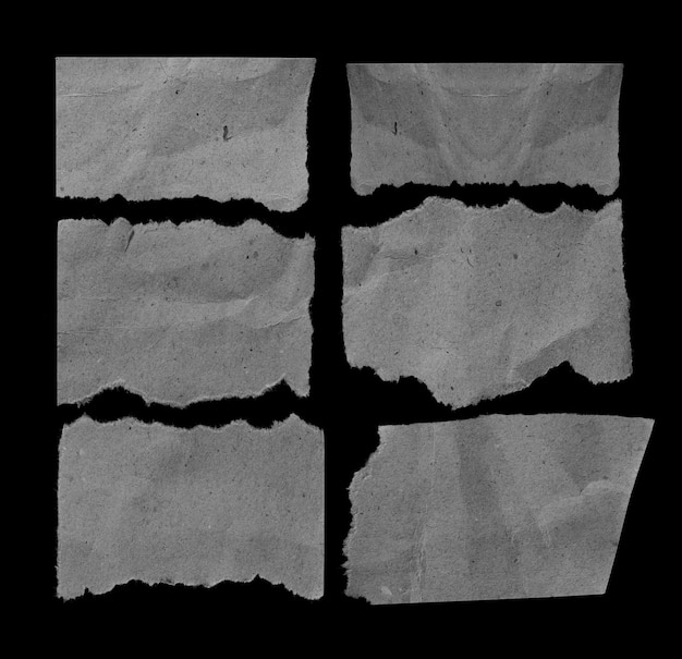 morceaux de papier déchiré sur fond noir avec espace de copie pour le texte