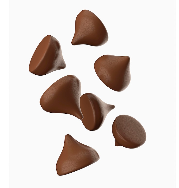 Photo morceaux de pépites de chocolat sur fond blanc illustration 3d de pépites de chocolat