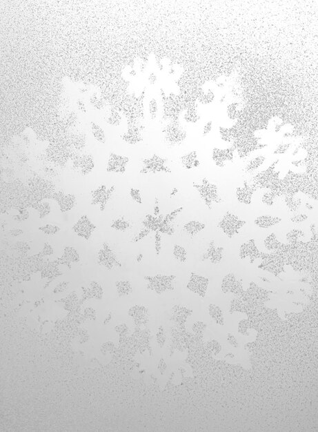 Photo motif flocon de neige sur la fenêtre