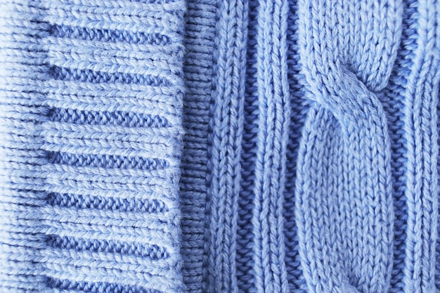 Motif de fond de texture Le tissu de laine est tricoté avec des aiguilles de tricot dans des nuances pastel