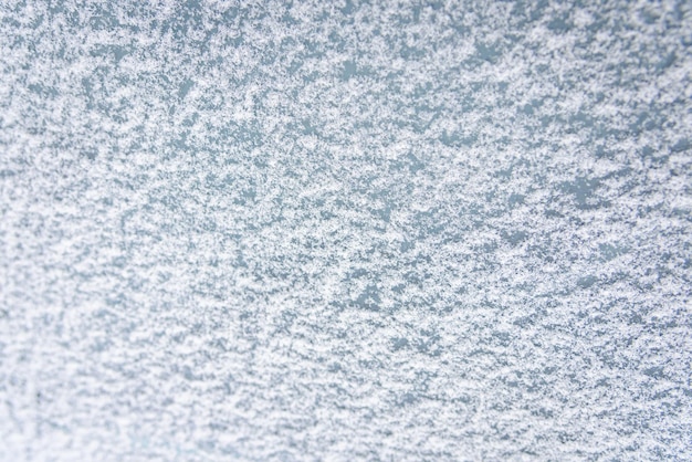Motif glacé abstrait sur verre Motifs glacés sur verre avec un espace vide pour le texte Arrière-plan de neige d'hiverArrière-plan glacé