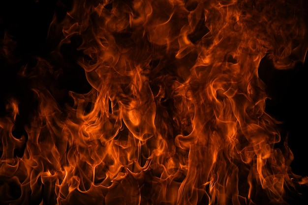 Le motif de mouvement de la flamme de feu la texture abstraite le fond de recouvrement de la flammes de feu brûlant