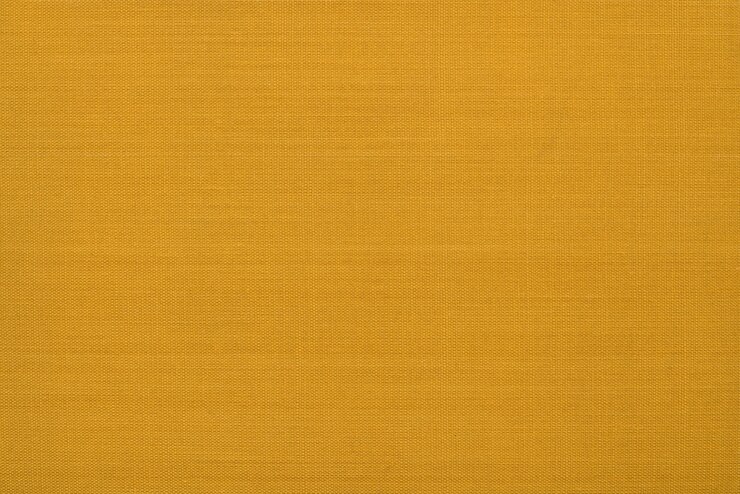 Photo motif en osier abstrait de couleur jaune pour le fond. vue macrophotographique détaillée en gros plan du matériau de décoration de texture, conception de texture d'arrière-plan pour affiche, brochure, catalogue ou livre de couverture.