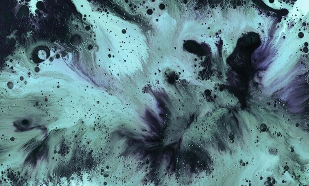 Motif de peinture de fond abstrait d'encre sous l'eau pigment vert cosmique taches acryliques éclaboussures et stries