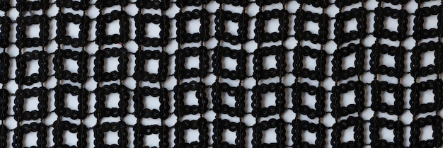 Photo motif tressé monochrome géométrique abstrait avec un design minimaliste répétitif de lignes carrées
