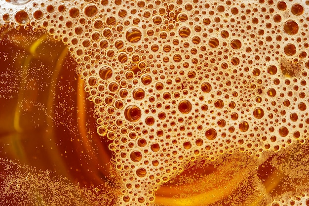 Mousse de bière et gros plan de bulles