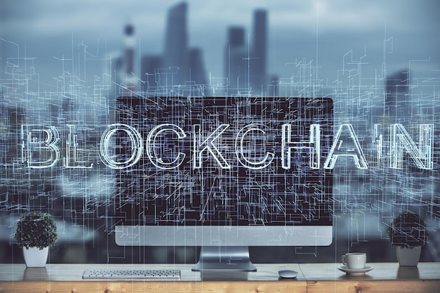 Multi exposition de l'hologramme du thème blockchain et du tableau avec l'arrière-plan de l'ordinateur Concept de la crypto-monnaie bitcoin