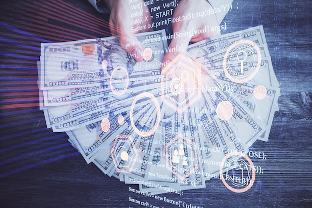 Multi exposition de la technologie de dessin hologramme et des billets de dollars américains et des mains d'homme concept de données
