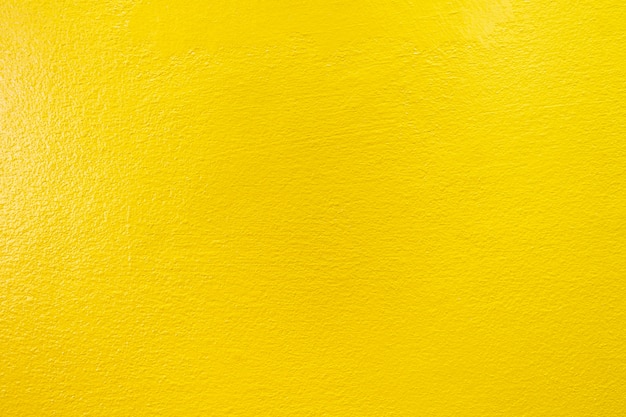 Mur de béton abstrait mur jaune texture béton pour le fond.