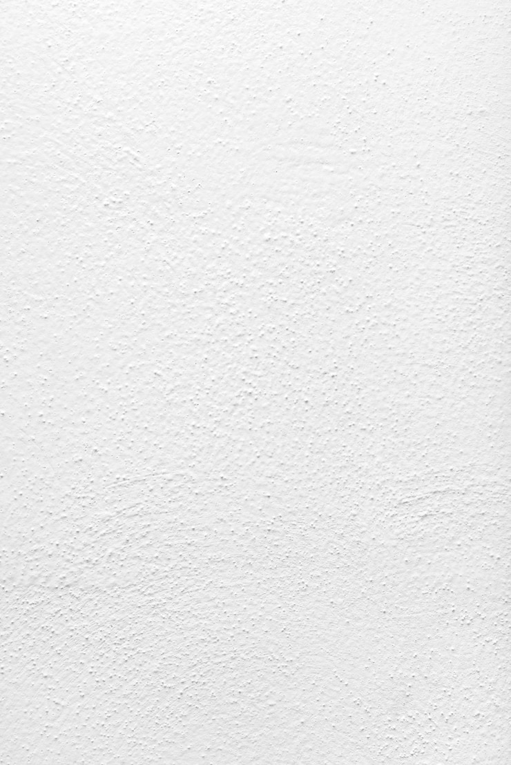 Photo mur en béton blanc texturé avec des rayures et des fissures