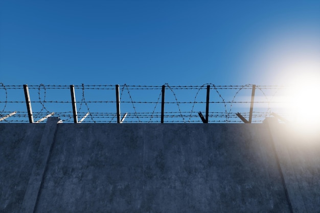 Mur de béton avec fil de fer barbelé contre le ciel bleu Concept prisons frontalières réfugiés solitude 3D