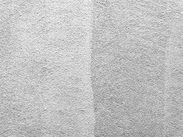 Mur de béton patiné et sale fond de texture en noir et blanc.