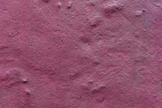 Mur de béton rose Le mur de béton est peint en rose