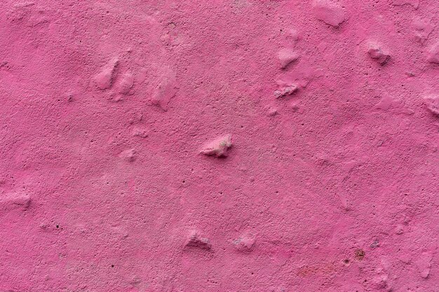 Mur de béton rose Le mur de béton est peint en rose