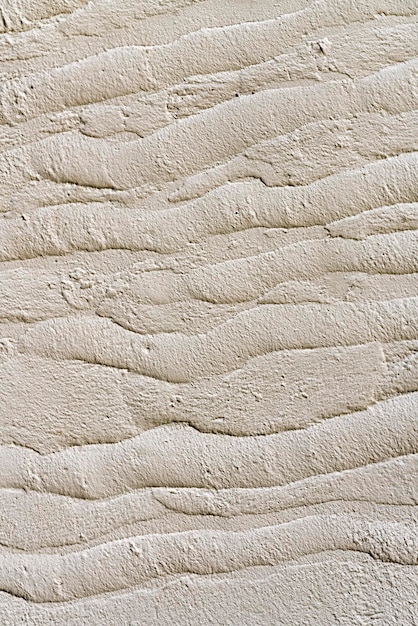 Mur blanc avec des vagues de texture